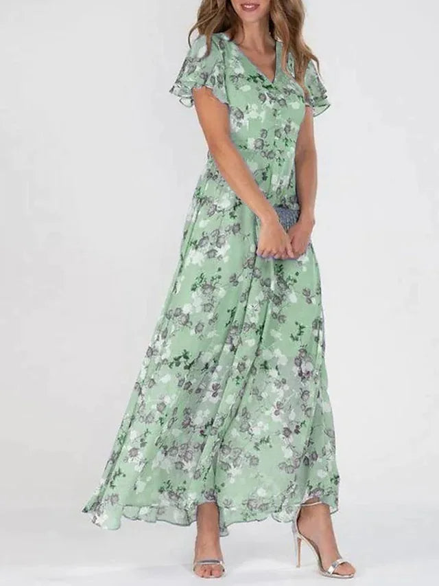 Robe midi élégante à fleurs – Parfaite pour un style raffiné et romantique
