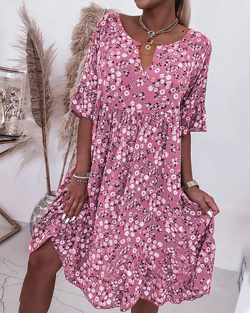 Robe midi fleurie – Élégance et fraîcheur pour toutes les occasions