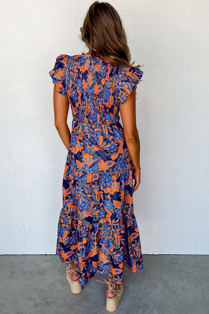 Robe fleurie à col en V et volants élégante