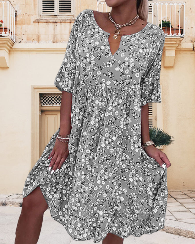 Robe midi fleurie – Élégance et fraîcheur pour toutes les occasions