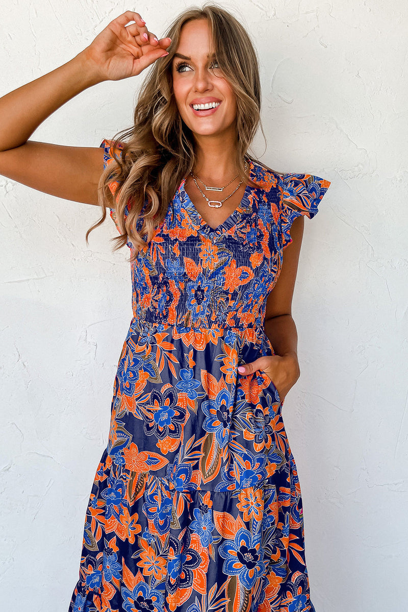 Robe fleurie à col en V et volants élégante